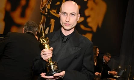 Daniel Blumberg poses with his Oscar