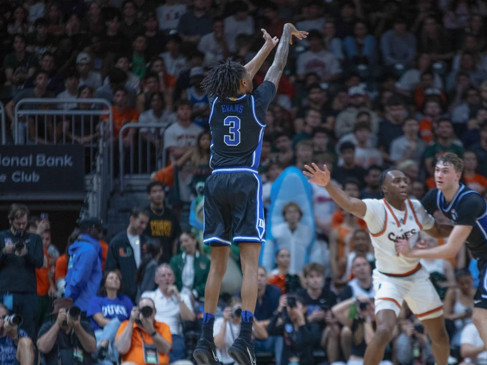 Isaiah Evans attempts a 3-point basket against Miami.