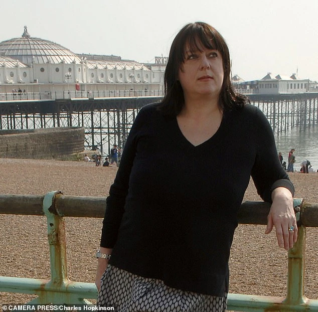 Julie at her beloved Brighton beach before her spinal operation