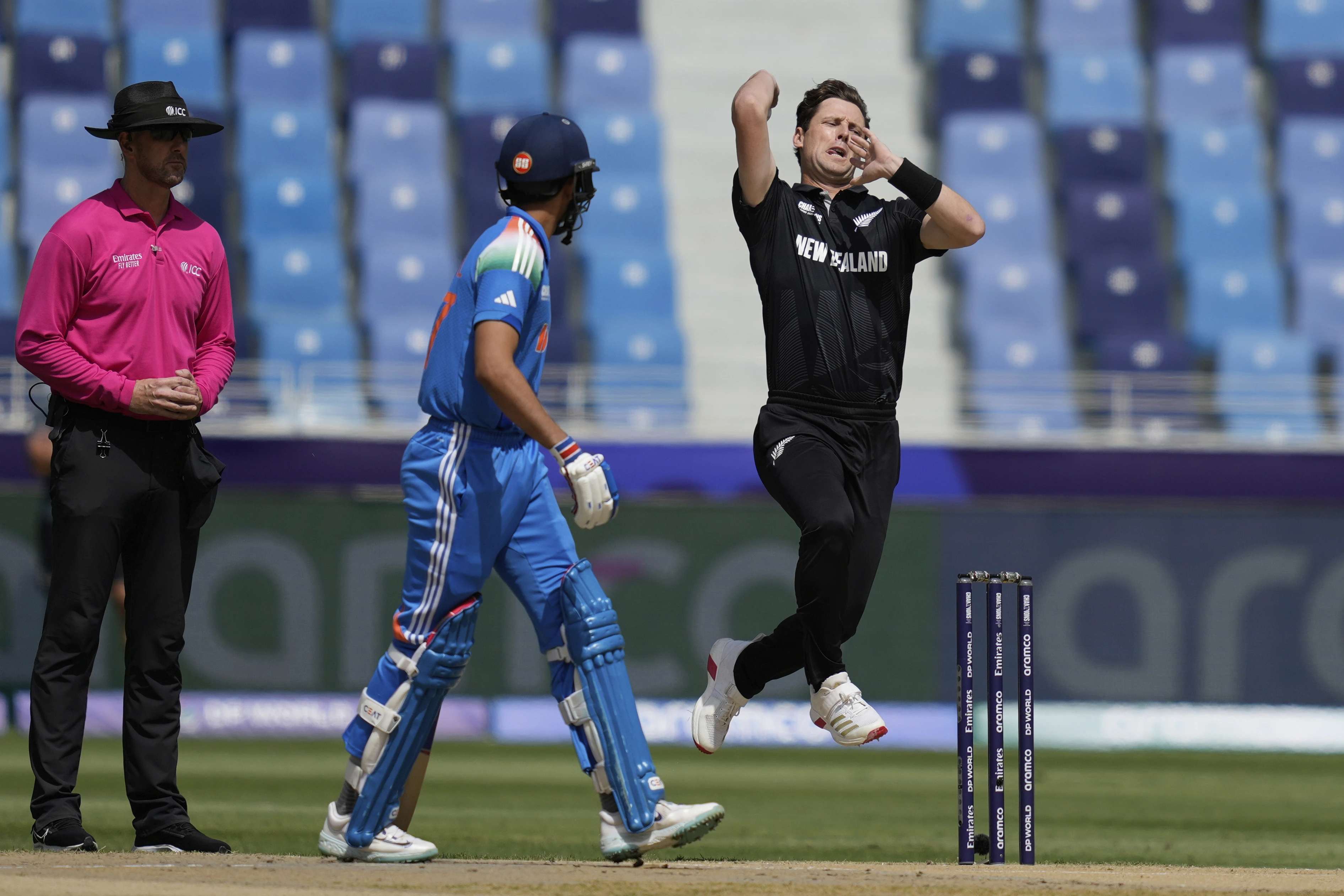 New Zealand's Matt Henry bowls a delivery during the ICC Champions Trophy cricket match between India and New Zealand at Dubai International Cricket Stadium in Dubai, United Arab Emirates, Sunday, March 2, 2025. (AP Photo/Altaf Qadri)